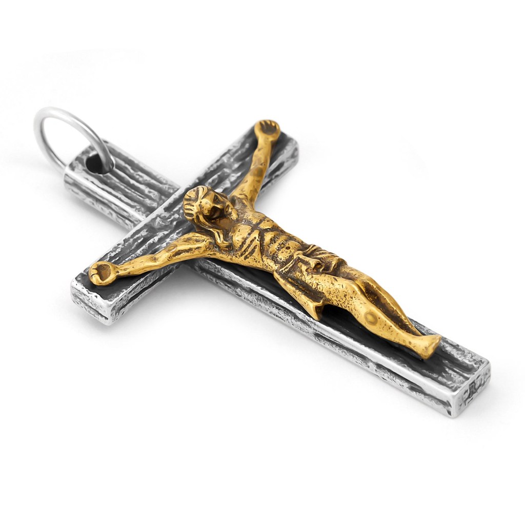 The Ronatelli Cascia 925 sterling silver crucifix pendant at an angle: a gold-tone figure in relief on a darkened, textured cross that hangs from a round ring