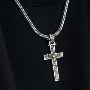 Ronatelli Cervia eagle cross 925 sterling silver pendant on a foxtail chain, worn over a black T-shirt