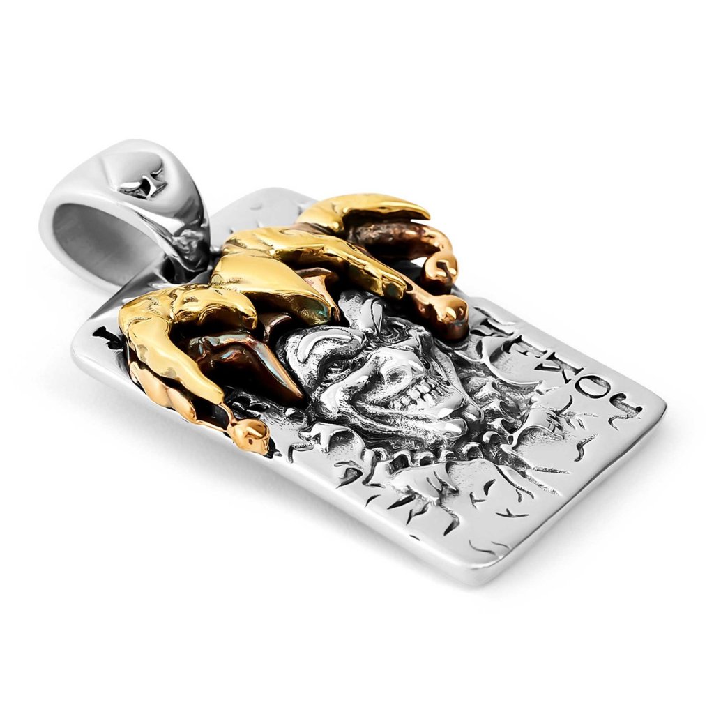 Ronatelli Fabro 925 sterling silver joker pendant at an angle, showing the gold-tone jester crown standing out from the card-shaped plate