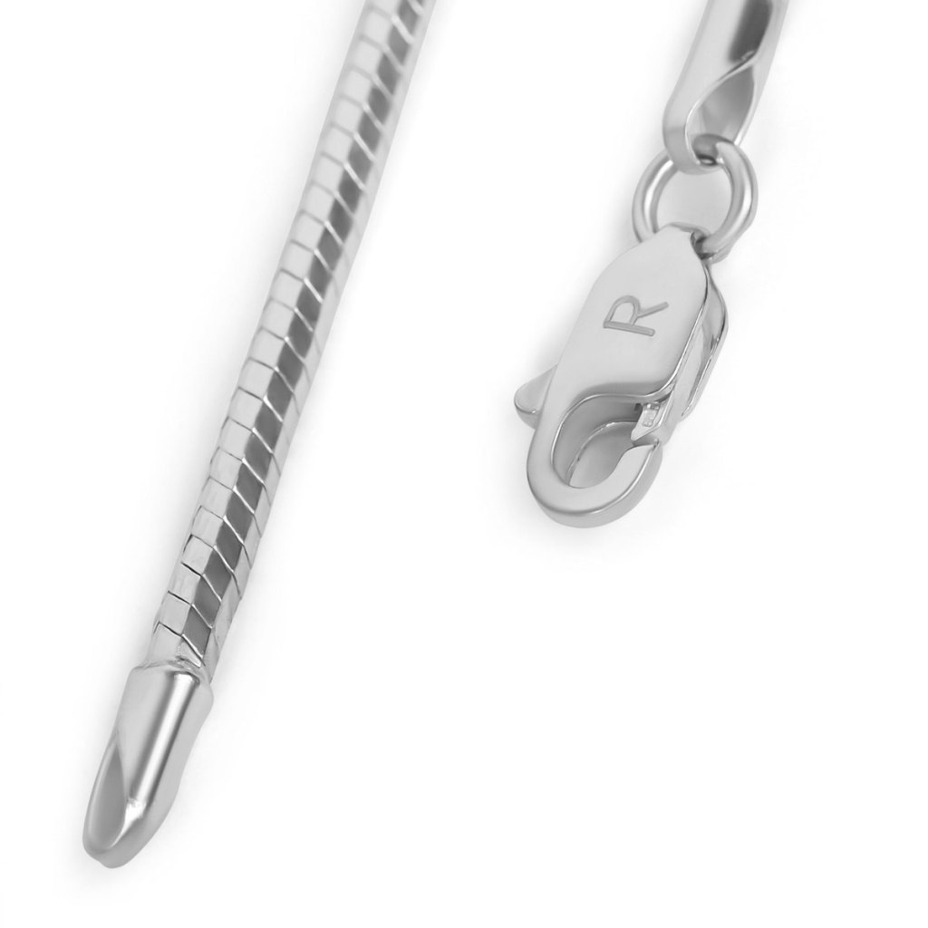 Close-up of the Ronatelli Fuli 2 mm snake chain: the smooth, platinum-plated snake links, a capped end, and a lobster clasp engraved with an R